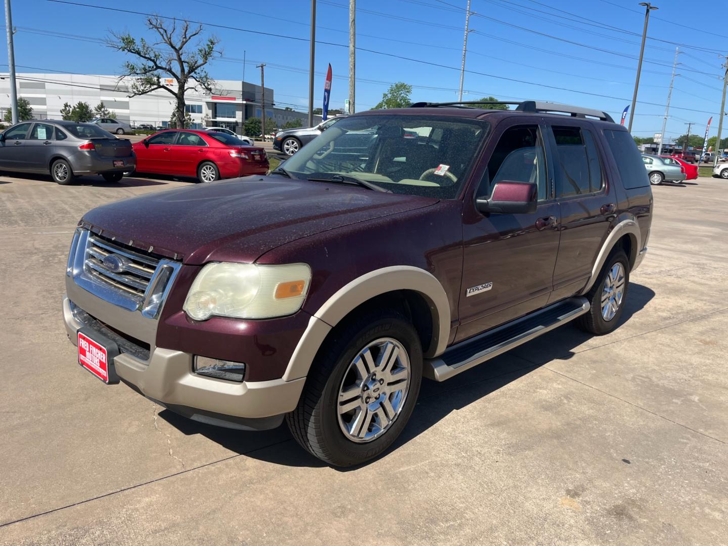 2006 maroom /TAN Ford Explorer Eddie Bauer 4.6L 4WD (1FMEU74816U) with an 4.6L V8 SOHC 16V engine, 6-Speed Automatic Overdrive transmission, located at 14700 Tomball Parkway 249, Houston, TX, 77086, (281) 444-2200, 29.928619, -95.504074 - Photo#2